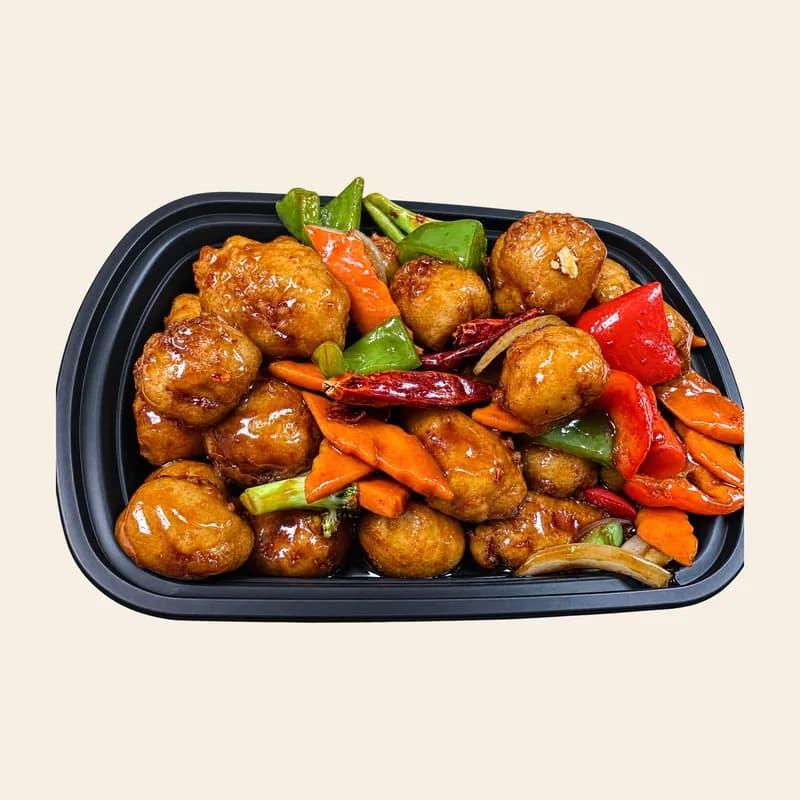 General Tso's chicken with red and green peppers and dried chilies